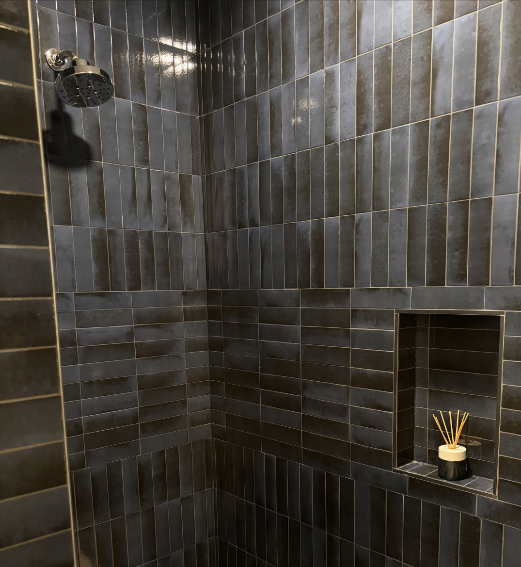 dark custom tiled shower in Rochester, MN