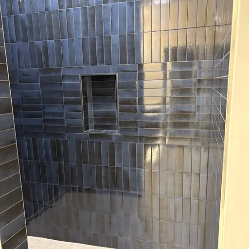 Residential tile shower installation at Carpet One 
