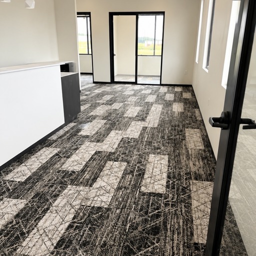 Commercial carpet tile installation in office hallway