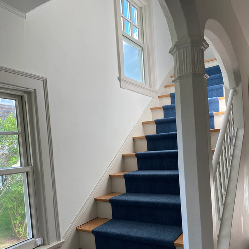 Residential carpet stair runner installation